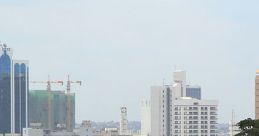 Skyline of Kampala, Uganda, featuring modern buildings and a prominent temple among urban development.