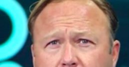 Pocket Alex Jones discusses current events with a serious expression, showcasing his distinct style and commentary focus.