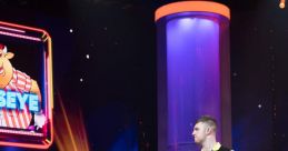 Contestants on a vibrant gameshow stage prepare for a darts challenge, showcasing excitement and competition.