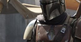 Mandalorian warrior in detailed armor stands ready, showcasing the iconic helmet and rugged style of “The Mandalorian.”