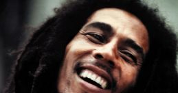 Bob Marley smiling, showcasing his iconic dreadlocks and joyful spirit, embodying reggae music and cultural influence.