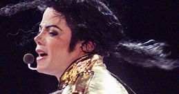 Michael Jackson performing in a striking gold jacket, showcasing his iconic dance moves and captivating stage presence.