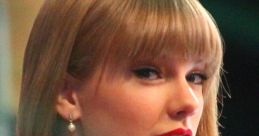 Taylor Swift showcases her glamorous look, featuring striking red lips and elegant style at a public event.