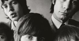 Classic black-and-white portrait of The Rolling Stones showcasing their iconic style and charisma during the 1960s.