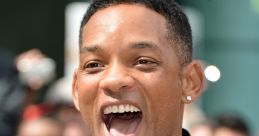 Will Smith smiling broadly at a public event, showing his charismatic personality and signature style.