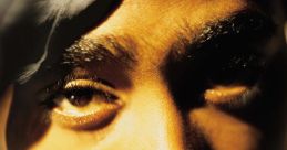 Close-up of 2Pac's intense gaze on the cover of "Greatest Hits," capturing his iconic style and legacy in hip-hop music.