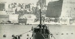 World War II submarine docked in a harbor, showcasing historical military architecture and maritime operations.