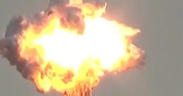 Tower explosion creating a massive fireball and smoke cloud, showcasing the intensity of heavy explosions in action.