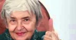 Cheerful elderly woman with gray hair giving a thumbs-up, exuding warmth and positivity, representing Stilwell Grandma.