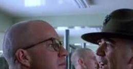 Intense confrontation between a drill sergeant and a recruit, showcasing memorable movie insults in military training.