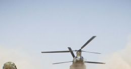 Military soldiers watching a helicopter take off, creating a dust cloud in a desert environment during a tactical operation.