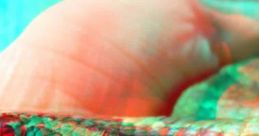 Close-up of a colorful snake held in a hand, featuring a vibrant 3D effect that highlights its unique patterns and scales.