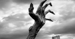 A haunting landscape featuring a gnarled hand emerging from the ground, set against a dark, ominous sky.