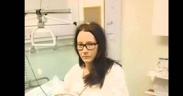 Young woman in hospital, looking serious while standing with medical equipment, showcasing a significant health challenge.