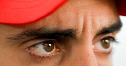 Focused expression of a driver in a red cap, capturing the intensity of Formula E Bordel with emotional dialogue.