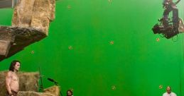 Behind-the-scenes of special effects production with green screen, actors, and crew setting up a scene.