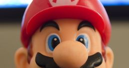 Classic Mario figure with red hat and blue overalls, representing the iconic character from Super Mario Bros franchise.