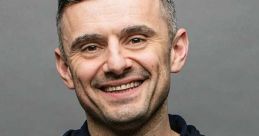 Gary Vaynerchuk smiling confidently in a navy hoodie, showcasing his approachable and inspiring personality for entrepreneurs.