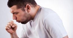 Young man experiencing coughing and wheezing, holding his stomach in discomfort against a neutral background.