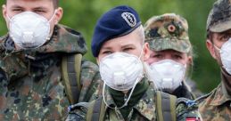 German soldiers in camouflage uniforms wearing face masks, showcasing military readiness and health precautions.