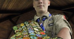 Scout proudly displays his achievements with a sash full of colorful merit badges at a scout camp.