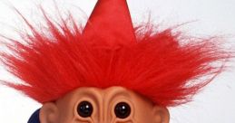 Colorful troll doll with red hair, clown outfit, and cheerful expression, embodying nostalgic charm and playful whimsy.