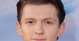 Tom Holland at a premiere event, showcasing his stylish attire and charismatic presence as Spider-Man.