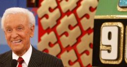 Bob Barker smiles as he hosts the iconic game show "The Price Is Right," with the game wheel in the background.