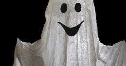 Whimsical white ghost decoration with a smiley face, perfect for Halloween celebrations and spooky home decor.