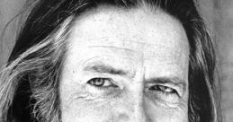 Portrait of Alan Watts, renowned philosopher known for popularizing Eastern philosophy in the West, with a contemplative expression.