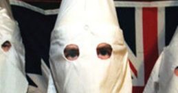 Krazy Klansman in traditional garb, emphasizing the group's controversial history and symbolism associated with racism.