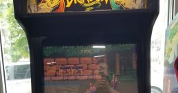 Double Dragon arcade machine with vibrant graphics, game controls, and free play sign, capturing a nostalgic gaming experience.