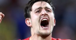 Harry Maguire celebrating passionately during the 2018 World Cup match, wearing England's iconic red jersey.