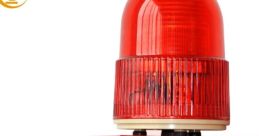 Red emergency siren with flashing light, designed for alerts in security and safety applications. Ideal for alarm systems.