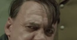 Adolf Hitler expressing intense emotions in a pivotal scene from "Der Untergang" (Downfall) film.