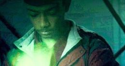 Boy activating a glowing green device on his wrist, reminiscent of Ben 10's Omnitrix in Hyperscan series effects.