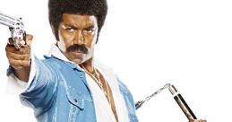 Black Dynamite poses with a gun and nunchaku, showcasing retro style and 1970s action film vibes.