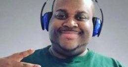 Man wearing a green shirt with "Just Give Me One" slogan, headphones on, peace sign gesture, embodying sports enthusiasm.