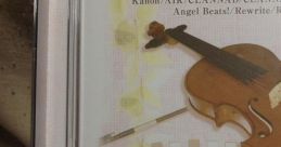 Cover art featuring a violin and piano keys, highlighting KeyCLASSIC's themes from games like Kanon and Clannad.