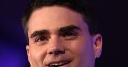 Ben Shapiro speaking at an event, engaging the audience with a confident smile and passionate expression.