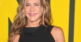 Jennifer Aniston smiles confidently in a stunning black dress at a premiere event, showcasing her iconic style and elegance.