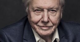 Portrait of David Attenborough exuding wisdom, wearing a blue jacket, showcasing his iconic presence in nature documentary filmmaking.