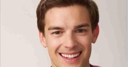 Cheerful young man in a red leather jacket and black t-shirt with lightbulb design, showcasing MatPat's creative persona.