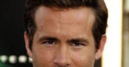 Ryan Reynolds smiles confidently in a stylish grey suit, showcasing his charismatic personality and charm.