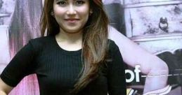 Ayu Ting Ting poses confidently in a stylish outfit, showcasing her signature fashion and vibrant personality.