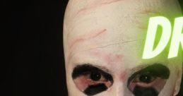 Mysterious figure with white face paint, dark eyes, and syringes, evoking eerie themes in a dramatic and haunting setting.