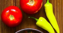 Fresh Chilean salsa with tomatoes, onions, and spicy peppers, served in a rustic bowl. Perfect for enhancing meals.