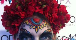 Vibrant Dia de los Muertos makeup featuring intricate sugar skull design and red floral headdress, capturing cultural celebration.