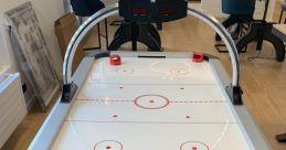 Air-Hockey The ambience of the Brighton Pier Arcade fills your ears as you approach the Air Hockey tables. The electronic