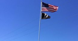 Flagpole The of the flagpole line hitting the pole in the wind create a mesmerizing rhythm that is both soothing and